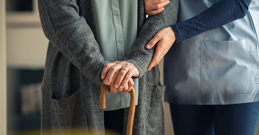 Elderly patient receiving physiotherapy